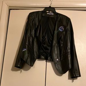 Nygard pleather moto jacket with floral details.